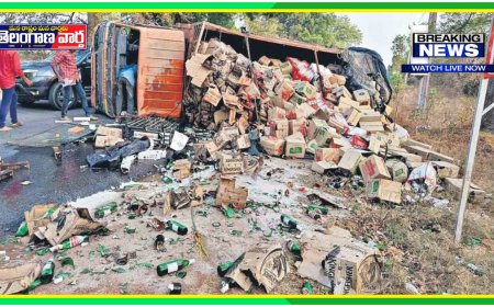 అదుపు తప్పి మద్యం వాహనం బోల్తా..