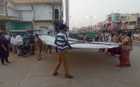 ఎన్నికల కోడ్ తో ఫ్లెక్సీల తొలగింపు